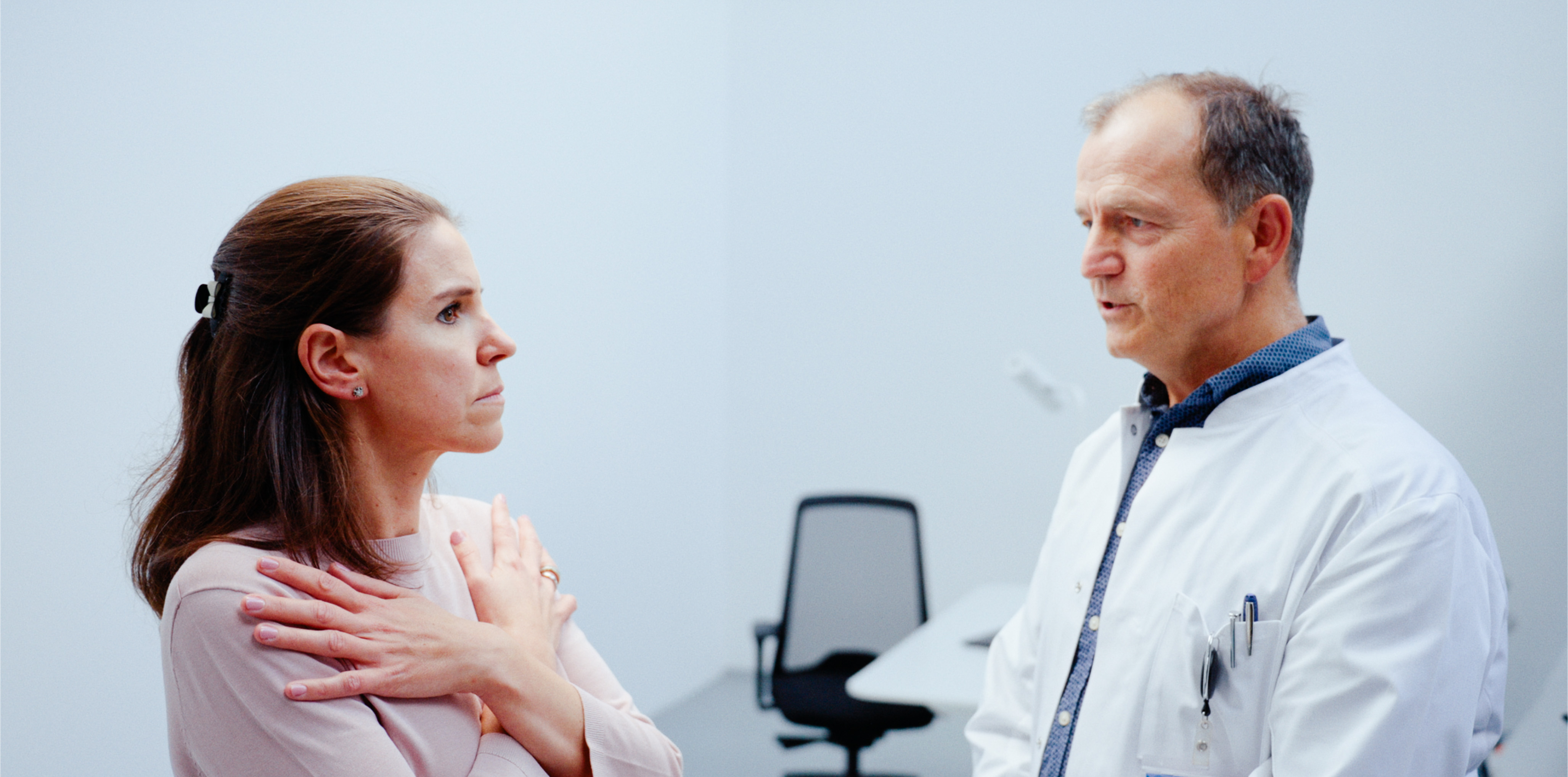 Patient discussing dizziness concerns with a clinician using VertifyMed
